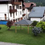 Gazebo in Legno KIOSK Tetto con tegole 629x347 cm - Antivento-37779