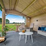 Onlywood Casetta in legno con tettoia laterale KUKKA 700 X 350 cm-82580