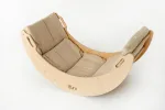 Arco Pikler girato come dondolo con cuscino imbottito beige